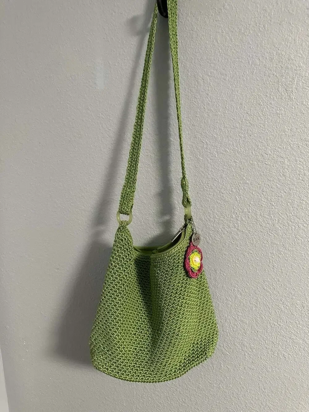 The Sak Green Crochet Shoulder Bag Hobo Purse with Flower Charm